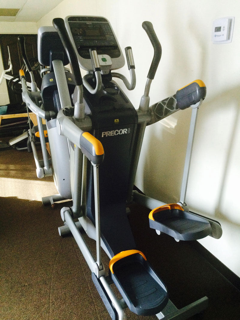 Precor AMT 100I Commercial Elliptical. Call Now For Lowest Pricing Guaranteed!