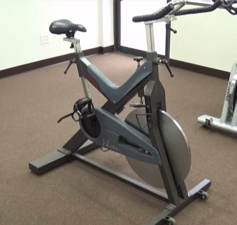 Star Trac V-Bike Commercial Indoor Cycling Bike. Call Now For Lowest Pricing Guaranteed!